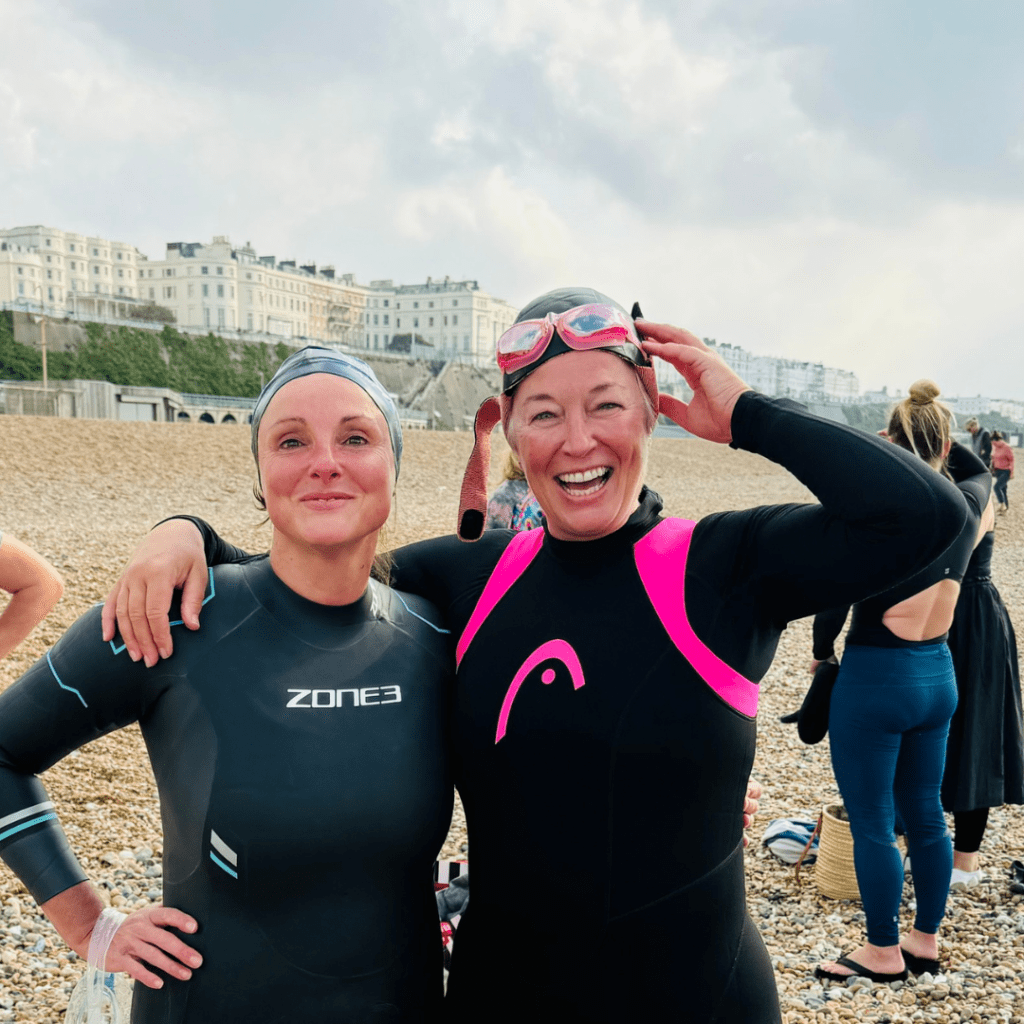 5km seas swim - two ladies with arms around each other